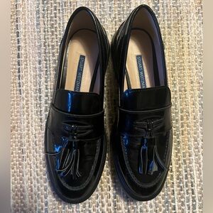 Stuart Weitzman Glossy Black Tassel Loafers